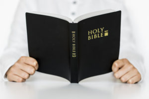 Man holding Bible