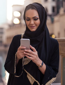Muslim woman on phone
