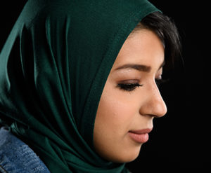 Muslim woman looking down