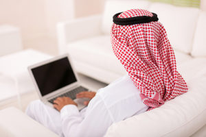 Saudi man on laptop