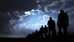 Refugees in silhouette 
