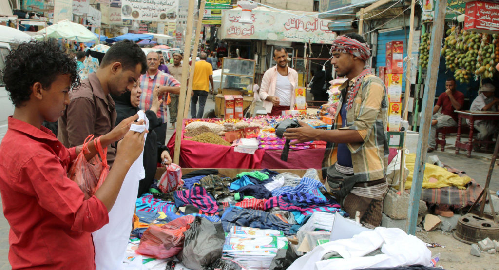 People at a market in Aden, Yemen